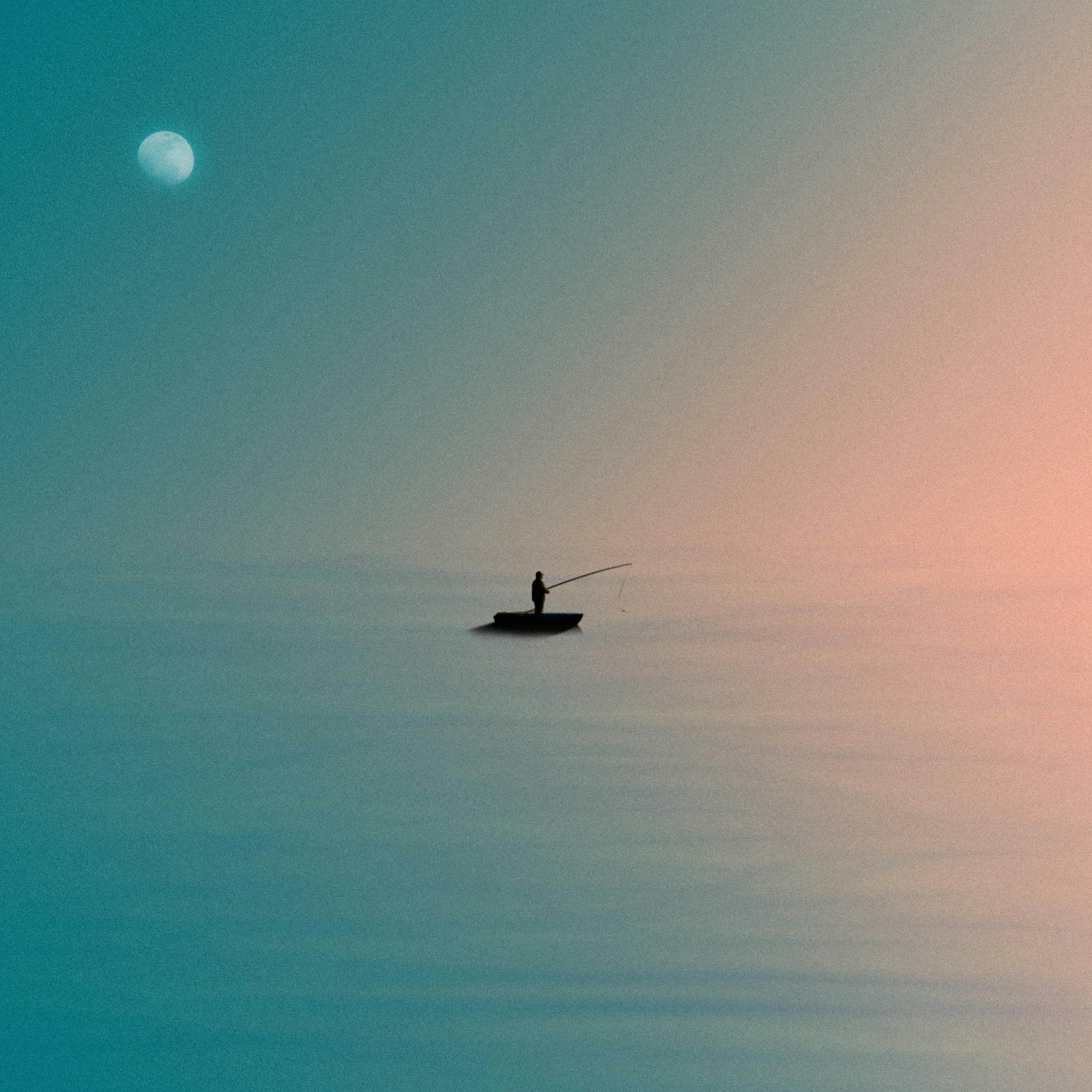 A lone fisherman silhouettes against a vivid, gradient sky under the moonlight.